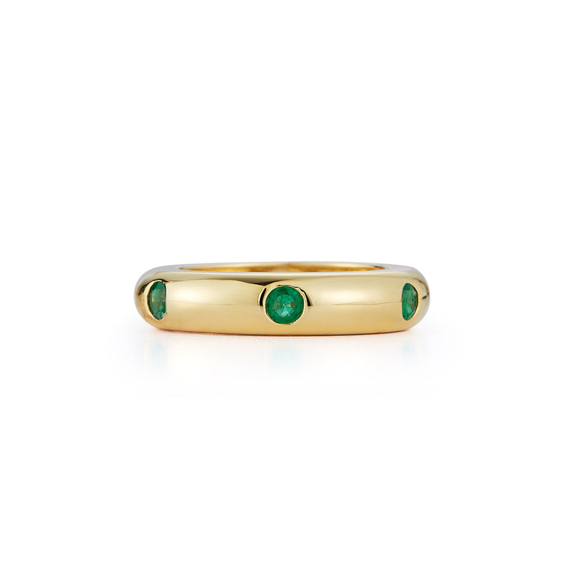 18k yellow gold stacking ring with diamond and emerald rounds.