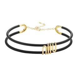 Black Caucciù choker with 18k yellow gold coil with adjustable clasp.