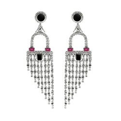 18K white gold earrings with white diamonds, onyx, and rubies.